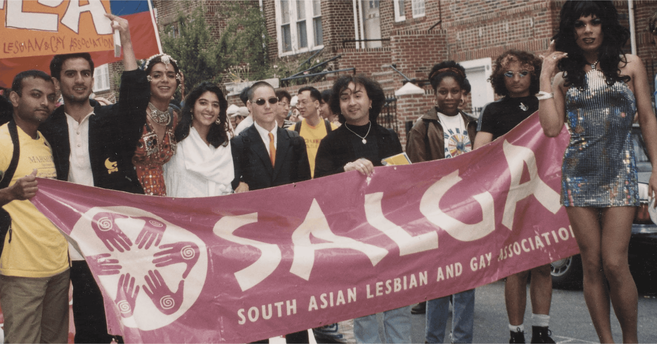 SALGA members marching with red banner.