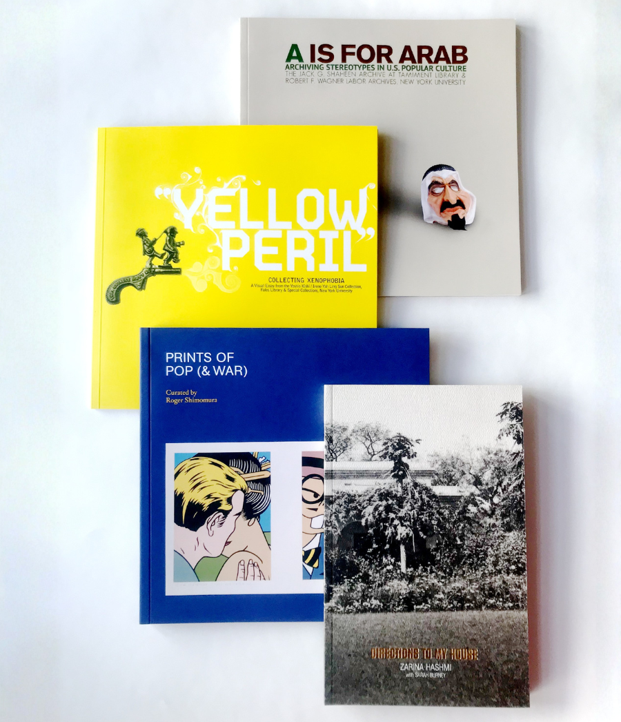 A photograph of four books published by the A/P/A Institute: A is for Arab; Yellow Peril; Prints of Pop (& War); Directions to My House